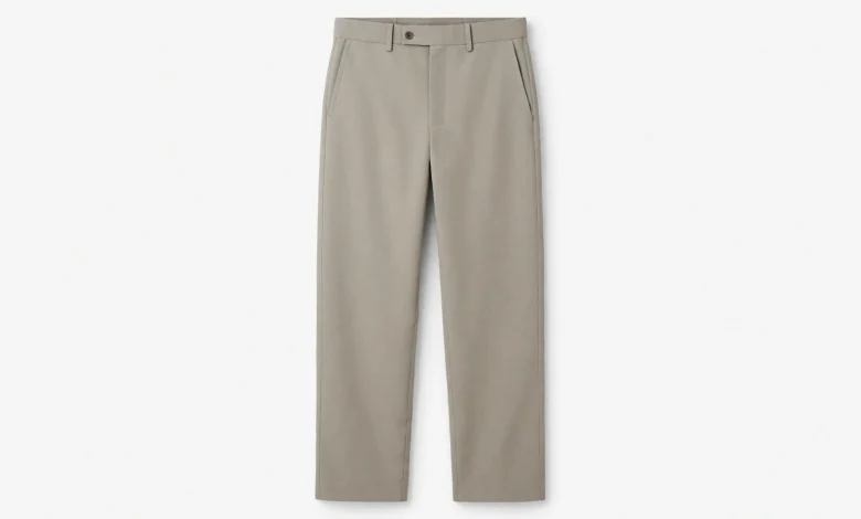 A pair of Mango trousers with a minimalist design, displayed on a clean white background, showing the straight cut, neutral color (such as beige or gray), and subtle details like front pockets and a waistband, emphasizing simplicity and modern elegance